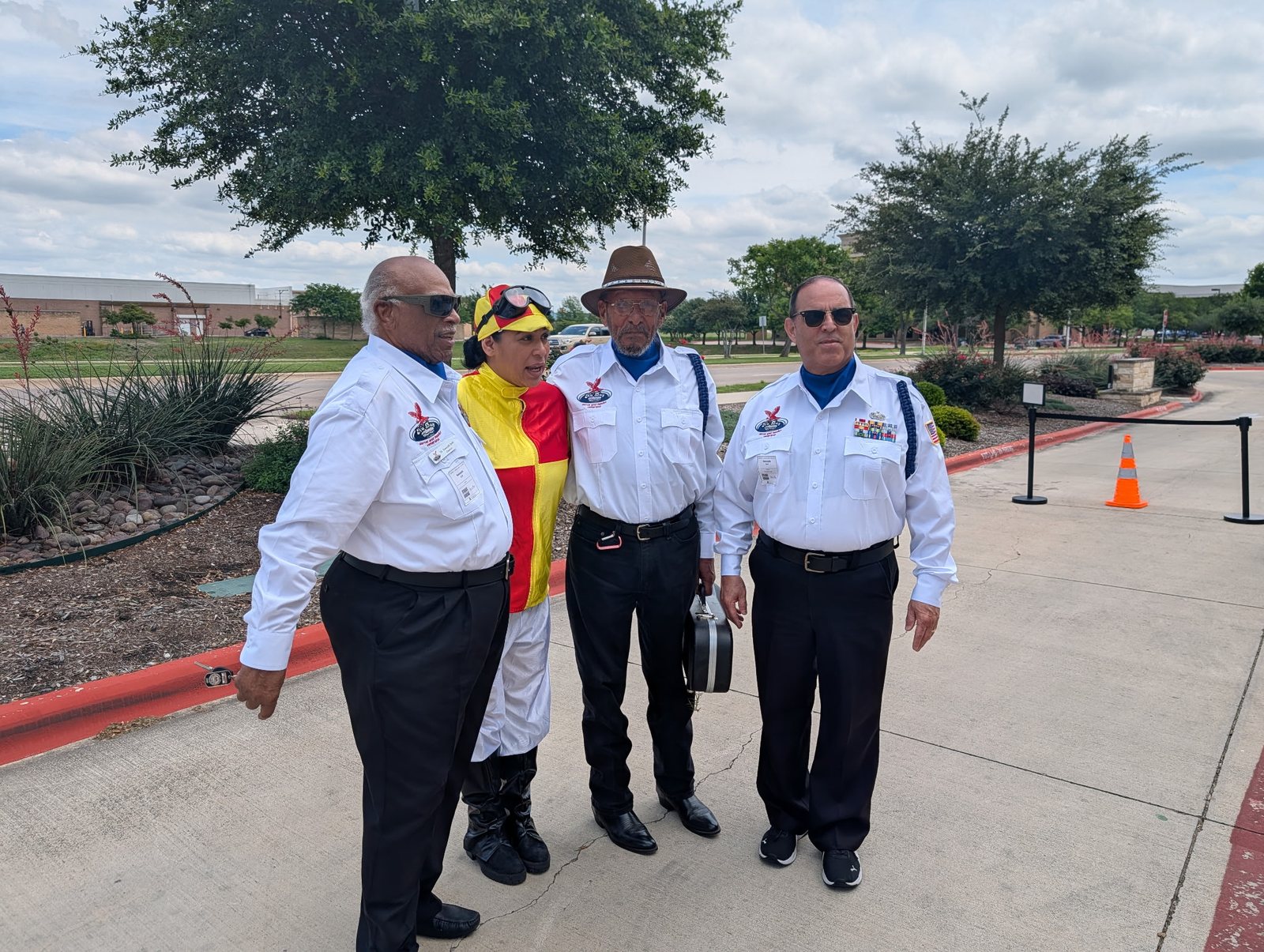 Members with a jockey at a community event
