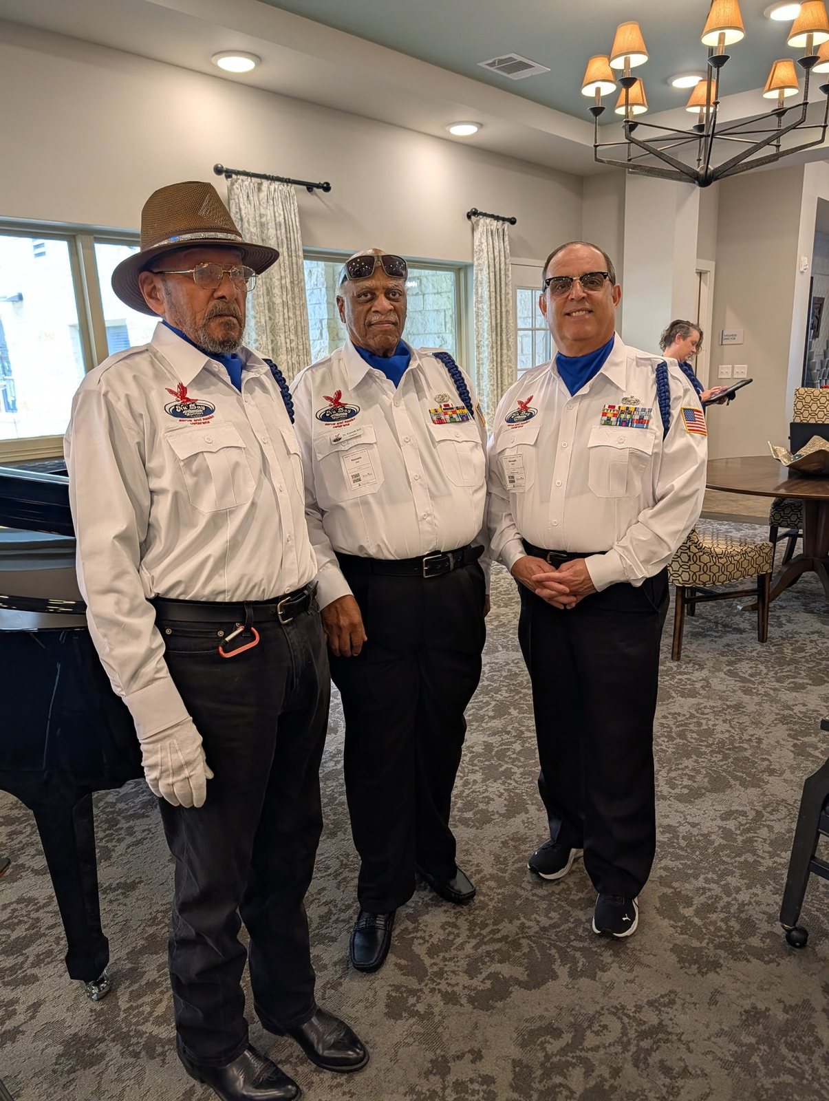 Nu Day Warriors members in uniform at a senior living visit