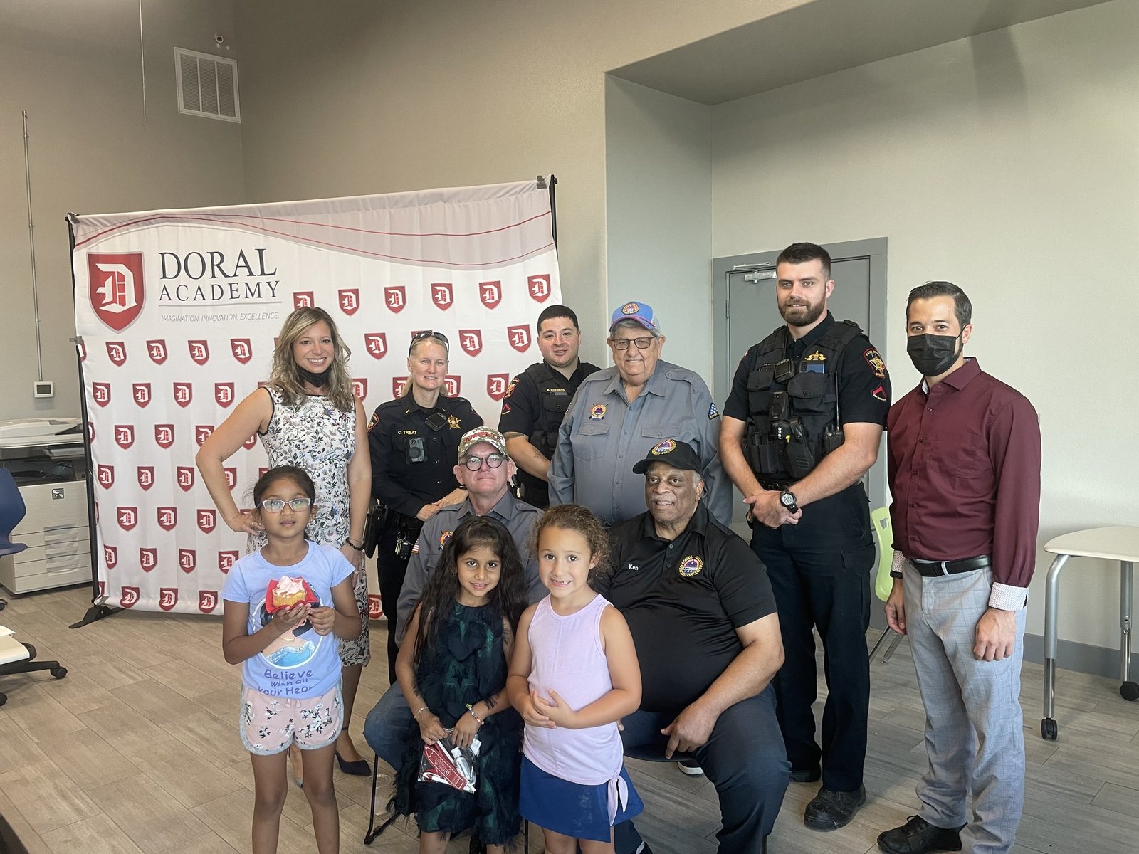 Nu Day Warriors with local law enforcement at Doral Academy